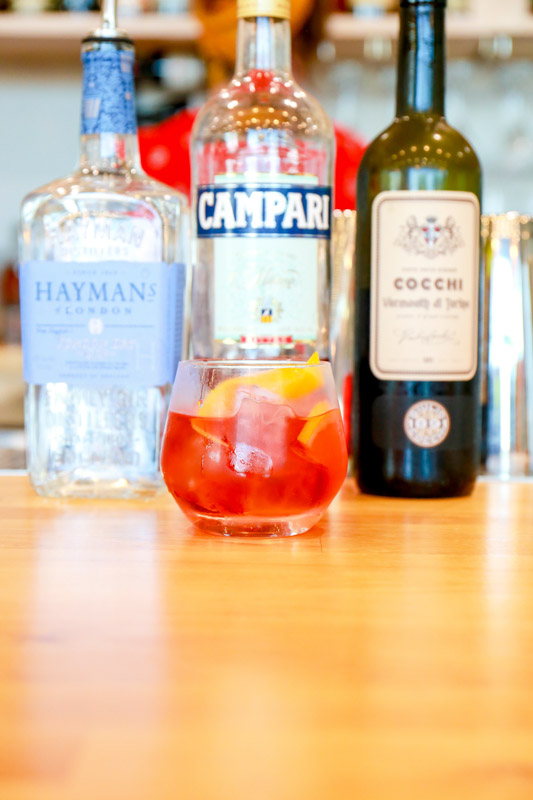 A class Negroni with Hayman's Gin, Campari, and Cocchi Vermouth.